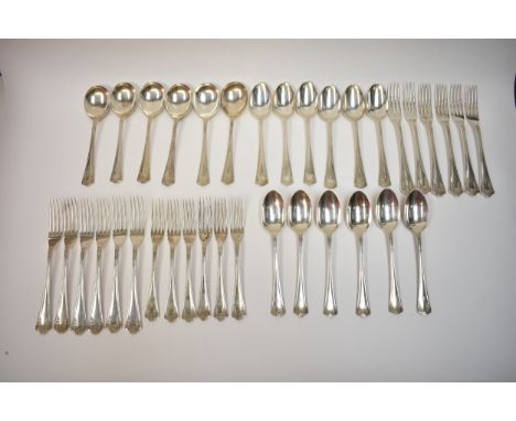 An Elkington &amp; Co Ltd silver part canteen including six soup spoons, six dessert forks, twelve dessert spoons, twelve tab