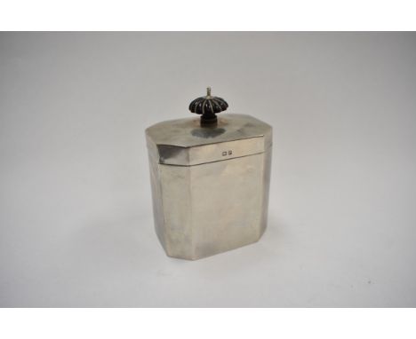 A Stokes &amp; Ireland Ltd rectangular silver tea caddy with chamfered corners and ebony knob, 10cm x 7.5cm,  150g