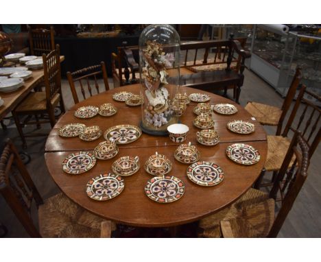 Crown Derby Imari tea wares comprising 12 tea plates, 12 cups and saucers, 2 sugar bowls, jug and a plate (40)