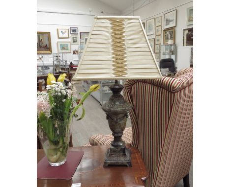 A metal classical urn form table lamp with pleated shade, 73cm tall