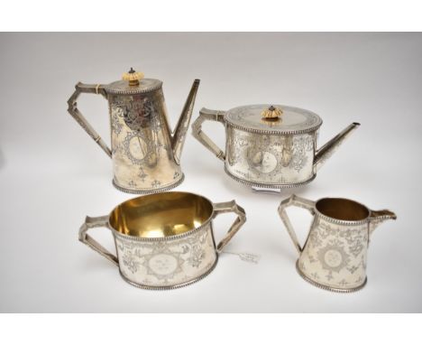 A Victorian Goldsmith Alliance Ltd highly ornate silver four piece tea set.  The bodies decorated with birds, hanging baskets