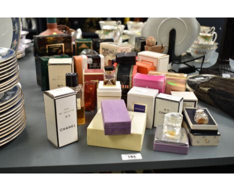 A quantity of perfume, to include Femme Rochas, Chanel No.5 and Tabu spray cologne ect, (33)
Condition report: Additional ima