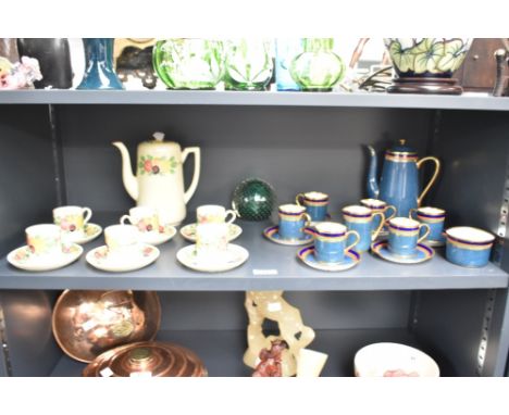 A Ridgway tea service hand painted with floral patterns on a crackle glaze ground, comprising of tea pot, 6 cups and saucers,
