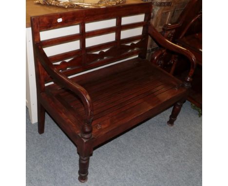 Modern teak bench with slatted hinged seat