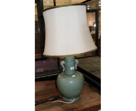 An Oriental Celadon glazed vase mounted as a table lamp