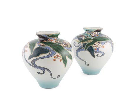 A PAIR OF JAPANESE OVOID SHAPED POLYCHROME VASES, each with short waisted neck and flared mouth, above a broad body painted a