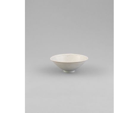 A QINGBAI 'TWIN FISH' BOWL, SONG/YUAN DYNASTY (1271-1368) of conical form, covered in a light bluish green glaze, the interio