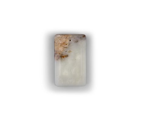 A PALE AND RUSSET JADE INSCRIBED PLAQUE, 19th Century, of rectangular form and pierced for suspension, carved to one side wit