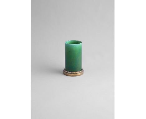 AN APPLE-GREEN GLAZED CYLINDRICAL VASE, Qing Dynasty (1644 -1911), with light crackle, the green glaze fading to a pale tone 