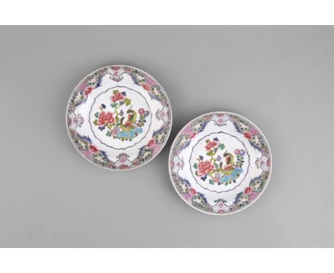 A PAIR OF FAMILLE ROSE DISHES, YONGZHENG (1723-1735) each painted and enamelled with a pair of egrets standing amongst lotus 