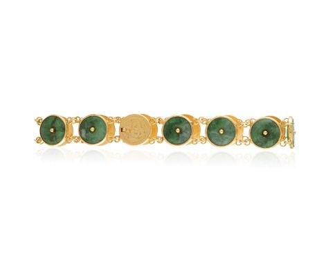 A JADEITE AND GOLD LINK BRACELET, composed of a series of jadeite jade links of circular form, each mounted in 24K gold, with