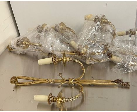 Three pairs of 20th Century gilt metal twin light wall appliques in the Louis XVI style