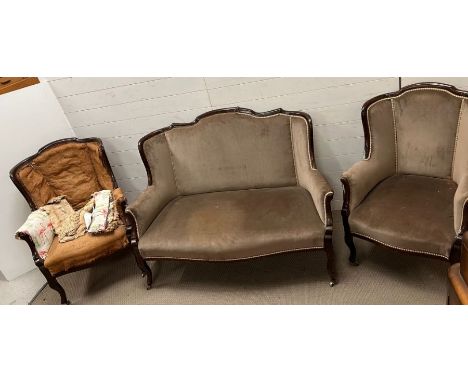 A Victorian salon suite comprising of two chairs and a two seater sofa 