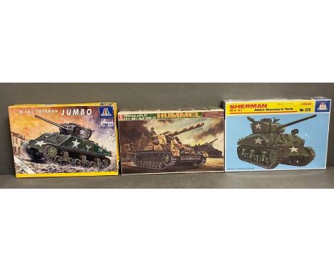 Two Italeri model kits an M-4A2 Sherman Jumbo and a Sherman M4A1 and a Bandai Hummel Auf GWIV 1:35 scale 
