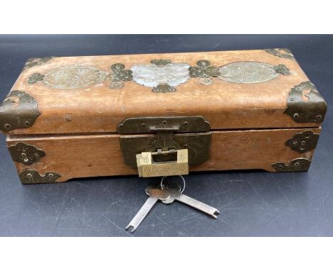 A Chinese jewellery box with three inset jade panels to the lid AF