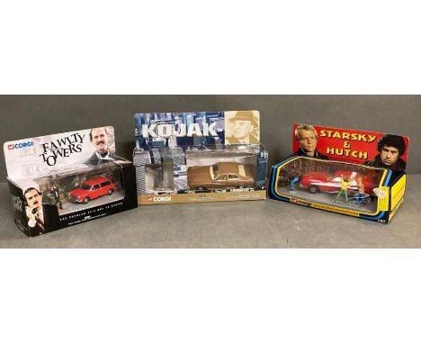 Three boxed models , A Corgi 00802 Fawlty Towers Austin 1300 Estate diecast model with Basil Fawlty figure, a vintage 1980's 