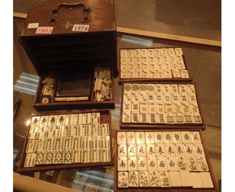 Boxed Mah Jong set with bone and bamboo tiles CONDITION REPORT: The set is missing one tile namely a 2 Bamboo, the set does b