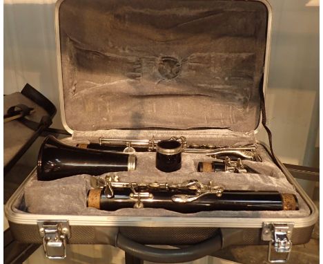 Cased Kinsman five piece clarinet