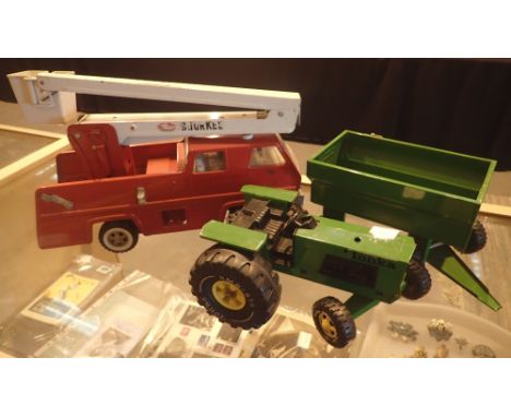 Tonka tin plate Snorkle fire engine and a tractor and trailer