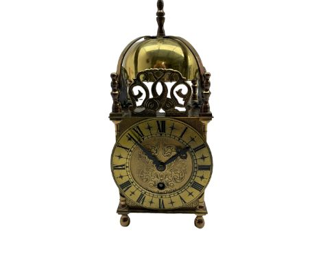 A contemporary 20th century brass cased replica Lantern clock with an English eight-day timepiece “Smiths” movement, lever pl