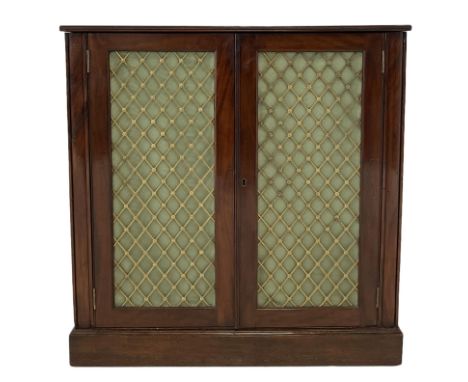 Mahogany side cupboard, fitted with two mesh doors, opening to reveal one shelf, raised on a plinth base Dimensions: Height:&