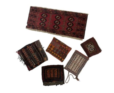 Five Kilim cushion covers of differing designs and sizes, together with one small runner rug 