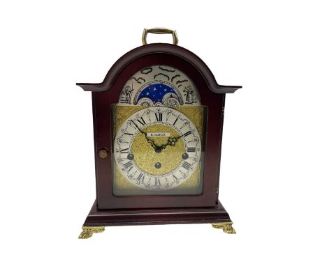 20th century mantle clock with a break arch top and three train Westminster chiming movement, with a brass dial and working m