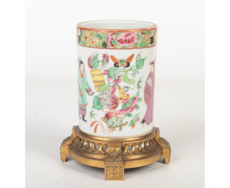 A 19th century Cantonese brush part mounted on a European ormolu base.  Typically painted in coloured enamels with figures an