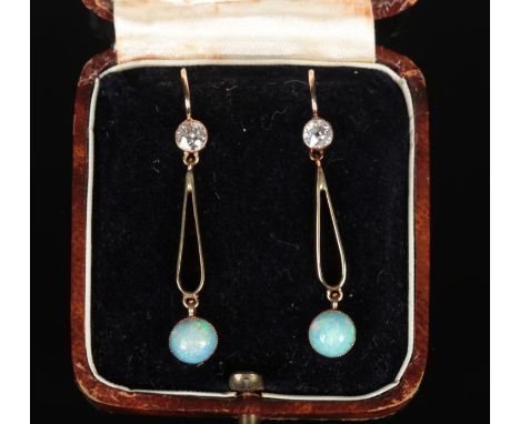 A cased pair of gold, opal and diamond pendant earrings. Each with a single old European cut diamond approximately 0.2ct and 