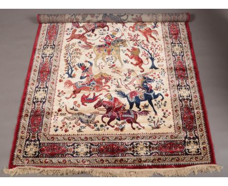 Red ground Kashmir rug with a traditional hunting scene, 240 x 160cm.  