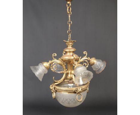 A gilt metal five branch hanging light in Neo-Classical style. Ornamented with ram masks and husk swags and having frosted an