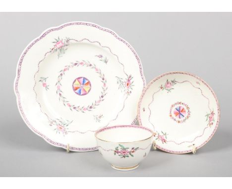 A rare Caughley plate and a teabowl and saucer. Painted in coloured enamels in Chinese export style with the Target pattern c