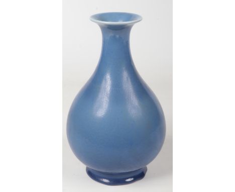 A 19th century Chinese pear formed vase. Decorated in Clair de Lune glaze. Six character Qianlong seal in underglaze blue, 30