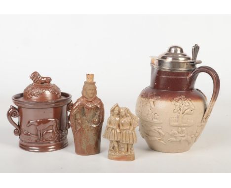 A 19th century salt glazed stoneware jug with silver plated mount and having sprigged mouldings. Along with a similar tobacco