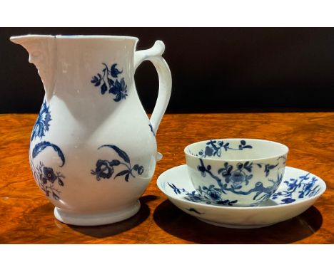 A Worcester Gilliflower pattern jug, decorated in underglaze blue, mask spout, 12.5cm high, crescent mark, c.1770; a Worceste