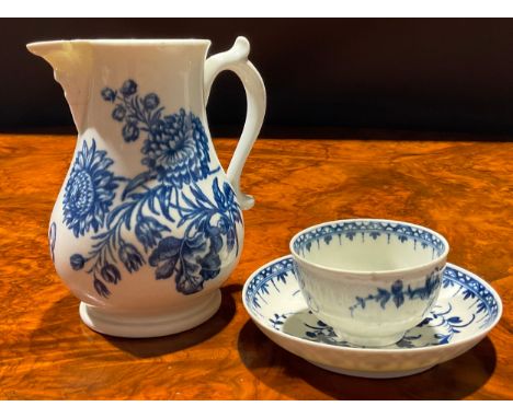 A Worcester Natural Sprays pattern jug, decorated in underglaze blue, mask spout, 14cm high, crescent mark, c.1770; a Worcest