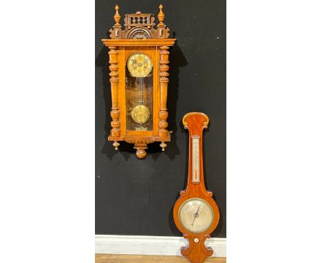 A 19th century mahogany wheel barometer; a Vienna wall clock (2) 