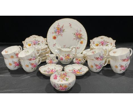 A Royal Crown Derby Posies pattern tea service, comprising a scalloped edge cake plate, 26cm, fivesandwich plates, 21cm, eigh