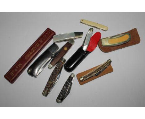 A collection of nine pen knives to include a cut throat razor