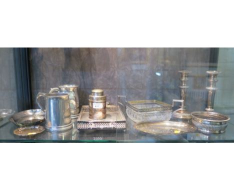 Eleven items of silver plate to include candlesticks, tea caddy, etc