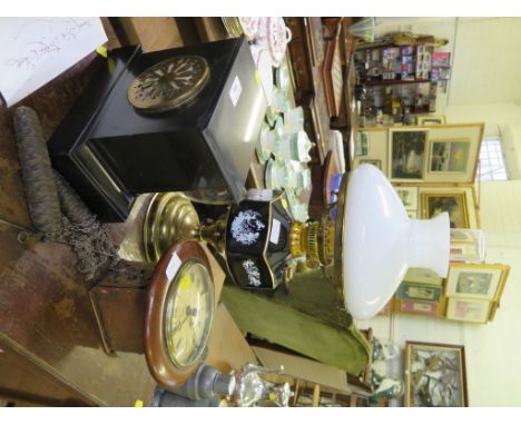 A slate mantel clock with inscribed dial and French movement, a small wall clock, and an oil lamp (3)