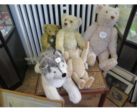 Four Steiff teddy bears, 39cm to 67cm and a dog 79cm (5)