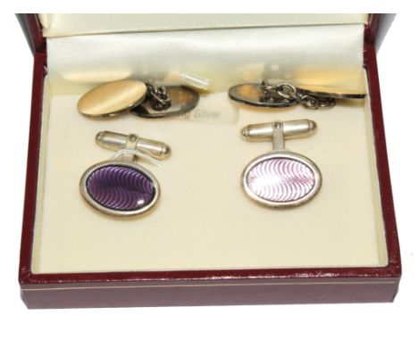 Two pairs of cufflinks, 9 carat gold on silver and the other silver with purple enamel