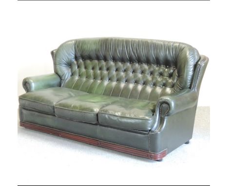 A modern green leather button back sofa, 187cm