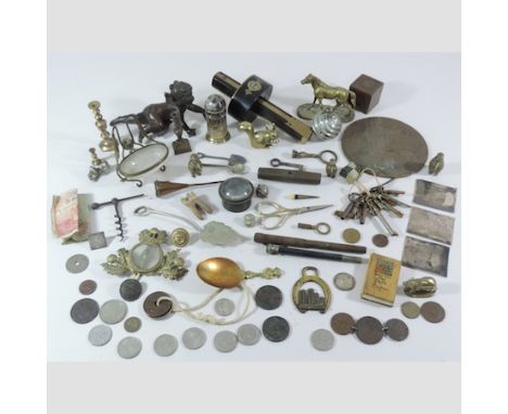 A collection of items to include an ebonised and brass mounted scale, stamped T. Graham, a death penny, miniature brass model