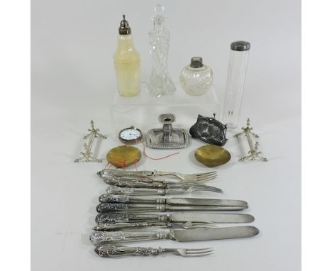 A collection of silver and silver plated items, to include a ladies purse, chamber stick and cutlery