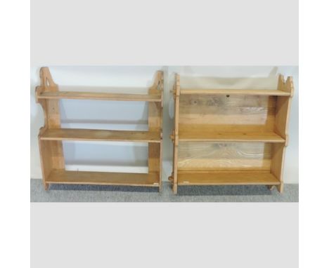 A light oak three tier hanging wall shelf, together with another, 59cm 