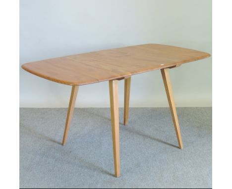 An Ercol light elm drop leaf dining table, 138 x 75cm