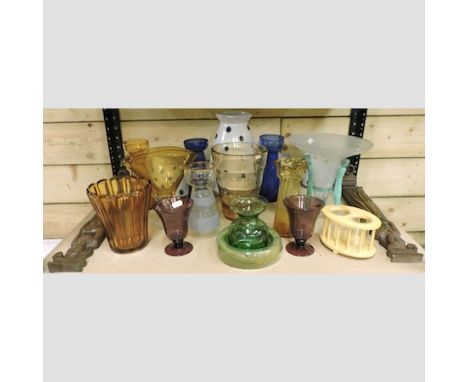 A shelf of coloured glass vases and bowls and a pair of carved wall sconces, together with a punch bowl set, boxed
