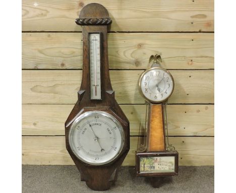A wall clock, together with a barometer